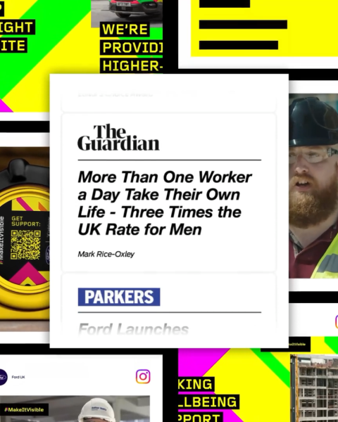 Guardian newspaper clipping sat in front of the Ford make it visible campaign wallpaper.