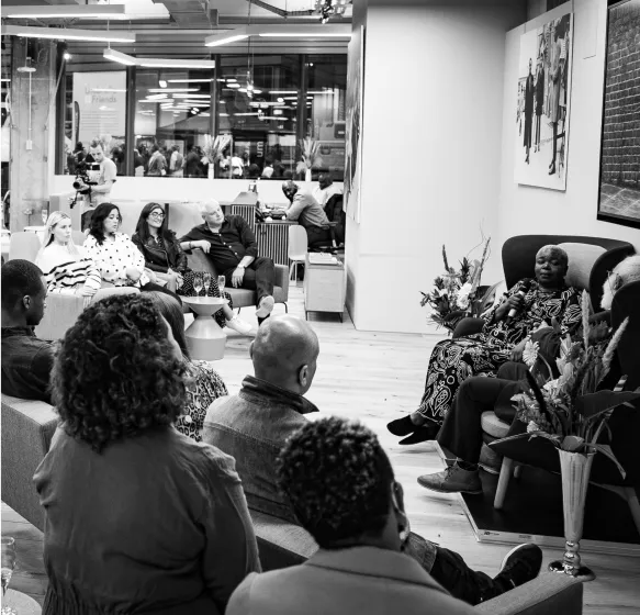 black and white image of a speaking event 